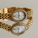 Tory Burch Oval Mother of Pearl Dial Gold Steel Strap Watch for Women - TBW6034