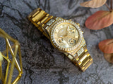 Guess Moonlight Multi Function Diamonds Gold Dial Gold Steel Strap Watch for Women - GW0320L2