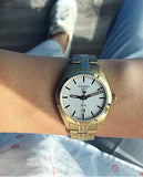 Tissot T Classic PR 100 Lady White Dial Gold Steel Strap Watch for Women - T101.210.33.031.00