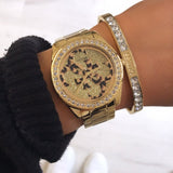 Guess G Twist Diamonds Gold Dial Gold Steel Strap Watch For Women - W1201L2