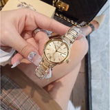 Burberry The Classic Champagne Gold Dial Gold Steel Strap Watch for Women - BU10109