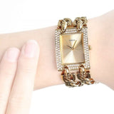 Guess MOD Heavy Metal Diamonds Gold Dial Gold Steel Strap Watch for Women - W0072L1