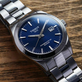 Jam Tangan Pria Tissot Gentlemen Powermatic 80 Silicium Blue Dial Silver Steel Strap - T127.407.11.041.00