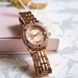 Guess Crystal Diamonds Rose Gold Dial Rose Gold Steel Strap Watch For Women - W11069L1