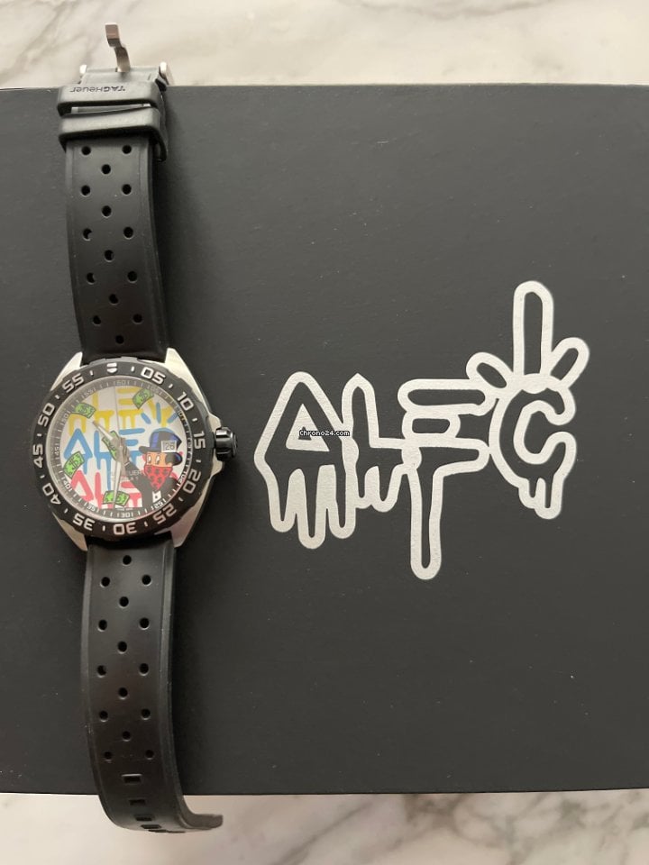 Alec monopoly tag on sale heuer watch price