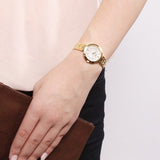 Tissot Flamingo Mother of Pearl White Dial Gold Steel Strap Watch For Women - T094.210.33.111.00