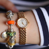 Tissot T Lady Lovely Silver Dial Gold Steel Strap Watch For Women - T058.009.33.031.00