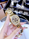 Guess G Twist Diamonds Gold Dial Gold Steel Strap Watch For Women - W1201L2