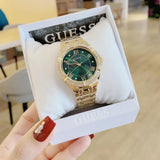 Guess Cosmo Diamonds Green Dial Gold Steel Strap Watch for Women - GW0033L8