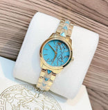 Michael Kors Petite Runway Mercer Blue Dial Gold Steel Strap Watch For Women - MK6673