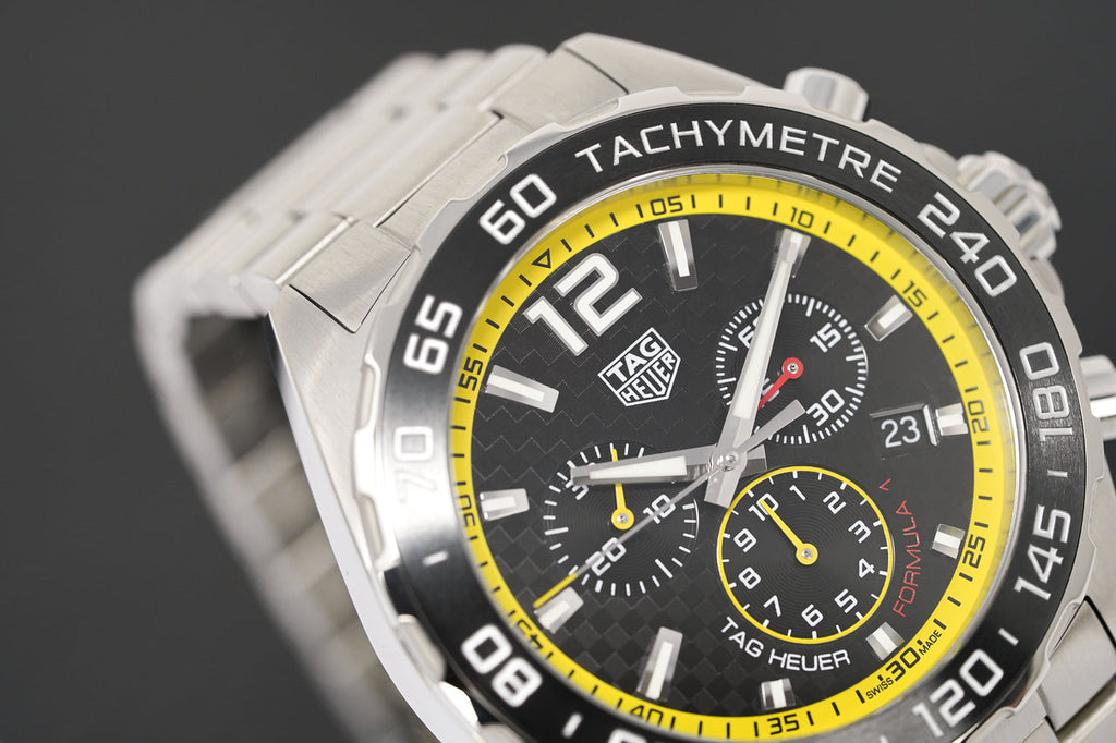 Black and yellow tag heuer 2025 watch