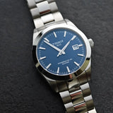 Jam Tangan Pria Tissot Gentlemen Powermatic 80 Silicium Blue Dial Silver Steel Strap - T127.407.11.041.00