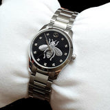 Gucci G Timeless Quartz Black Dial Silver Steel Strap Watch For Women - YA1264136