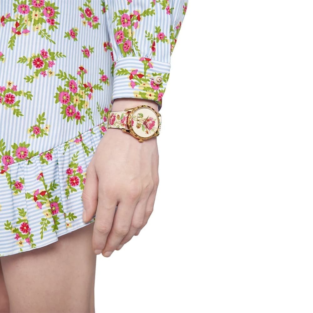 Gucci G Timeless Floral Gold Dial White Leather Strap Watch 