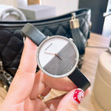 Calvin Klein Rise White Grey Dial Black Leather Strap Watch for Women - K7A231C3