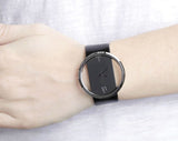 Calvin Klein Glam Transparent Dial Black Leather Strap Watch for Women - K9423107