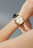 Guess Frontier Diamonds Gold Dial Black Rubber Strap Watch For Women - W1160L1