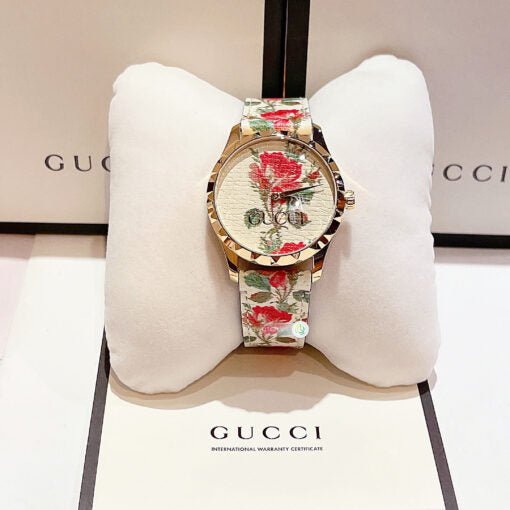Gucci G Timeless Floral Gold Dial White Leather Strap Watch  display picture 1
