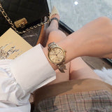 Burberry The Classic Champagne Gold Dial Gold Steel Strap Watch for Women - BU10109