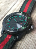 Gucci G Timeless Sport Black Dial Two Tone NATO Strap Watch For Men - YA126229