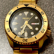Seiko 5 Sports Automatic Black Dial Gold Steel Strap Watch For Men - SRPK18
