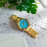 Michael Kors Lennox Analog Blue Dial Gold Steel Strap Watch for Women - MK7460