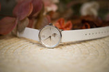 Calvin Klein Accent Silver Dial White Leather Strap Watch for Women - K2Y231K6