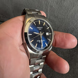 Jam Tangan Pria Tissot Gentlemen Powermatic 80 Silicium Blue Dial Silver Steel Strap - T127.407.11.041.00