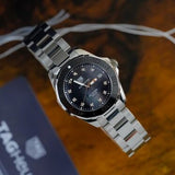 Jam Tangan Tag Heuer Aquaracer Quartz Dial Hitam dengan Tali Baja Perak untuk Wanita - WAY131M.BA0748