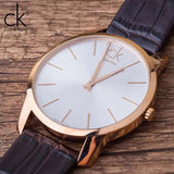 Calvin Klein City White & Gold Dial Brown Leather Strap Watch For Women - K2G23620