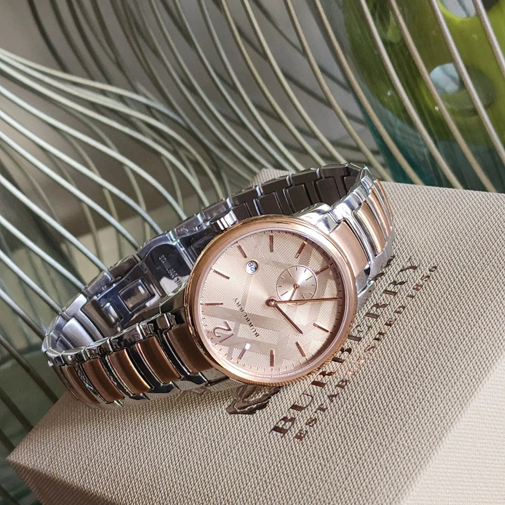 Burberry top gold watch