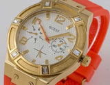 Guess Jet Setter Golden Dial Orange Rubber Watch For Women - W0564L2